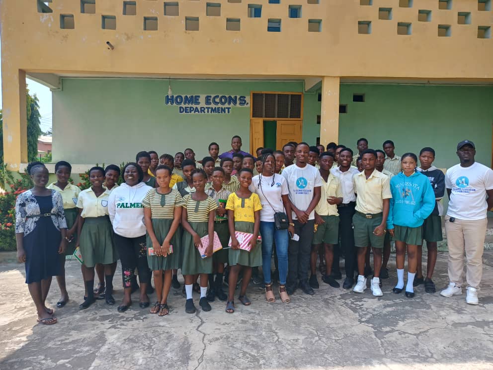 Students and YAAG volunteers gather after an outreach programme.