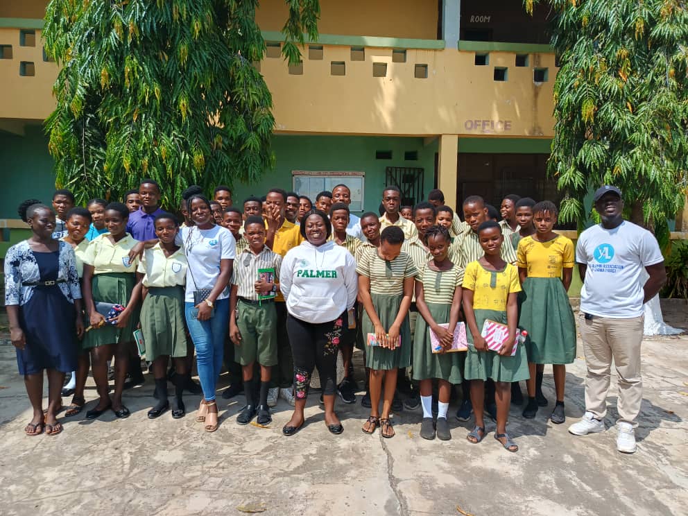 YAAG volunteers meet students during a community programme.