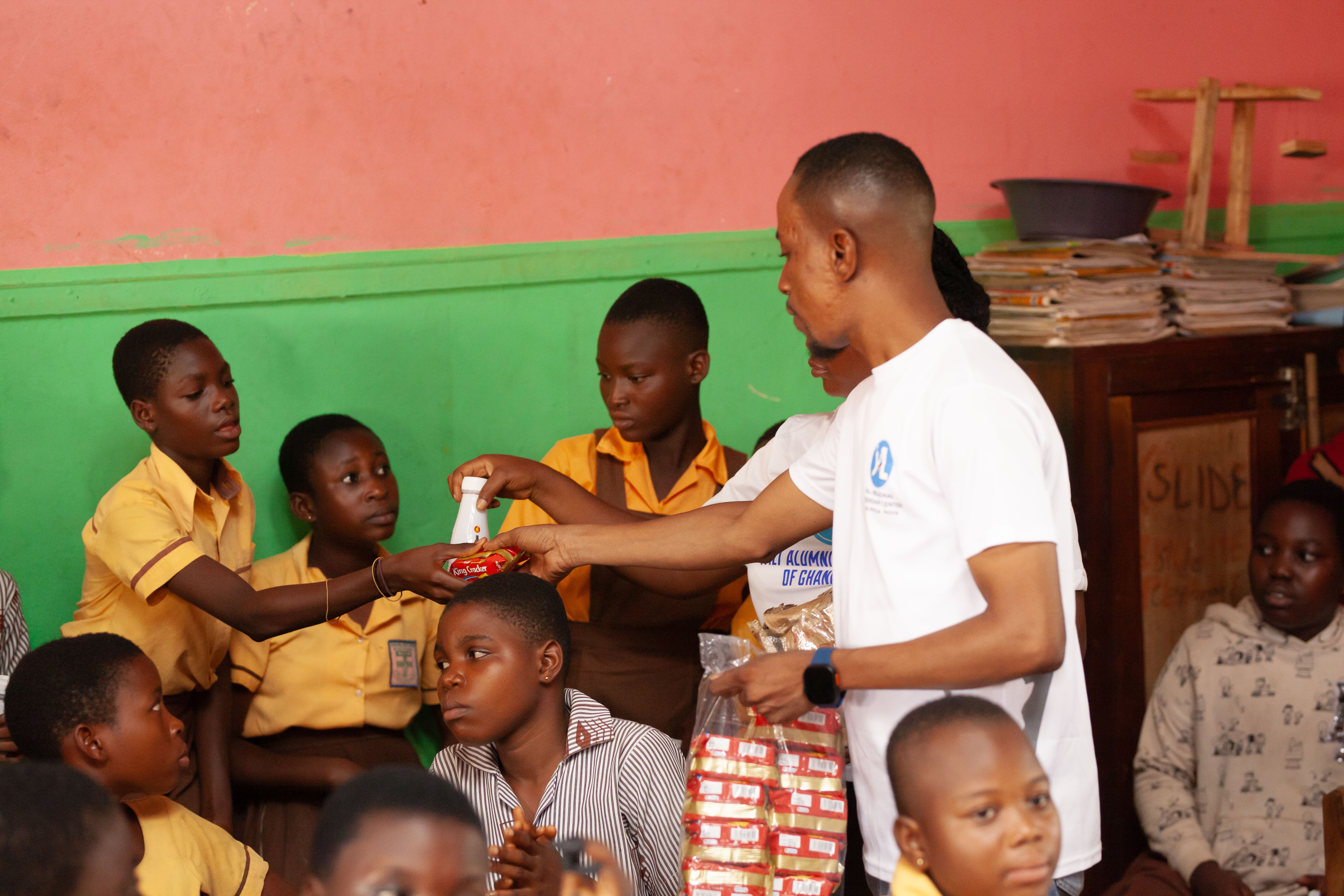 YAAG volunteers distribute refreshments during the student programme.