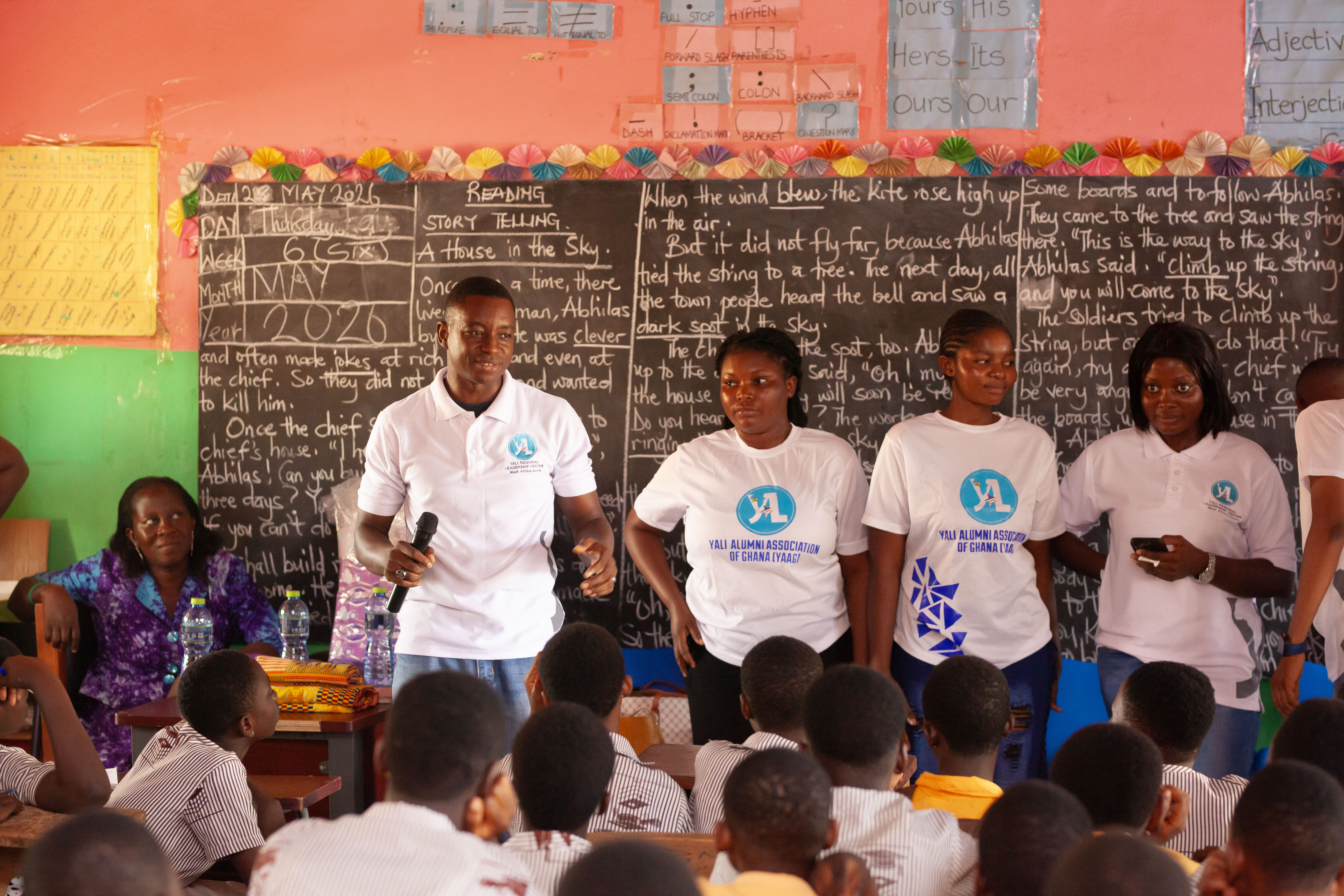 YAAG volunteers lead an interactive school outreach session.